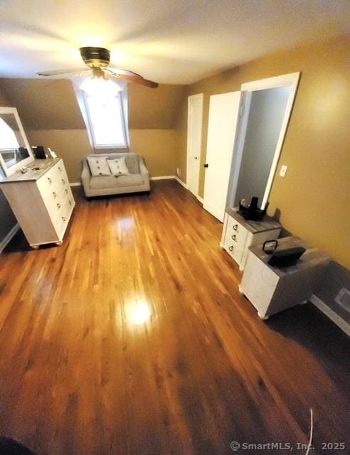 bonus room with hardwood / wood-style flooring, ceiling fan, and lofted ceiling