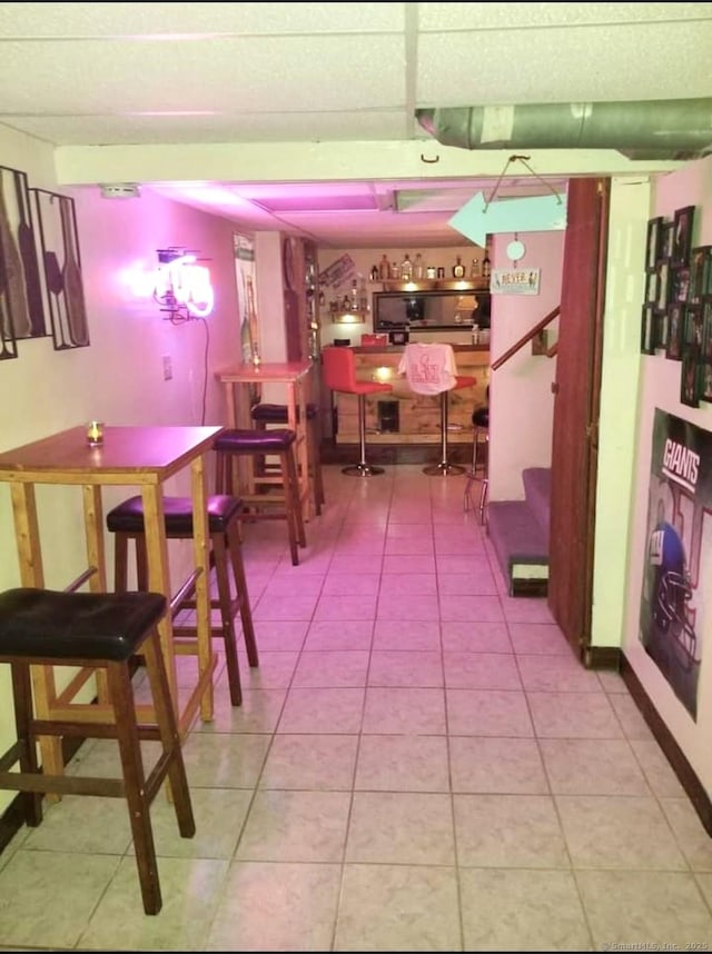 dining area featuring light tile patterned floors