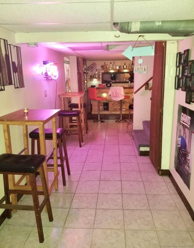 interior space featuring light tile patterned floors