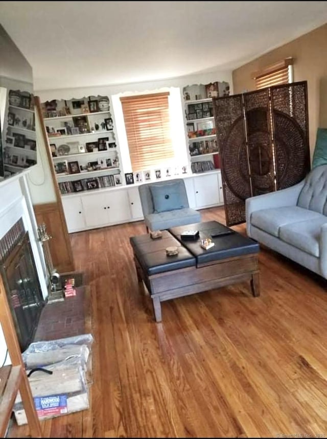 living room with hardwood / wood-style flooring