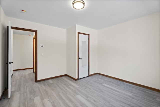 unfurnished bedroom with light hardwood / wood-style floors