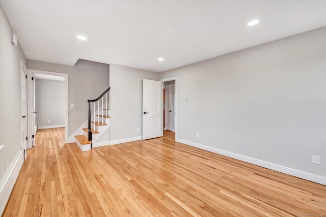 spare room with light hardwood / wood-style floors