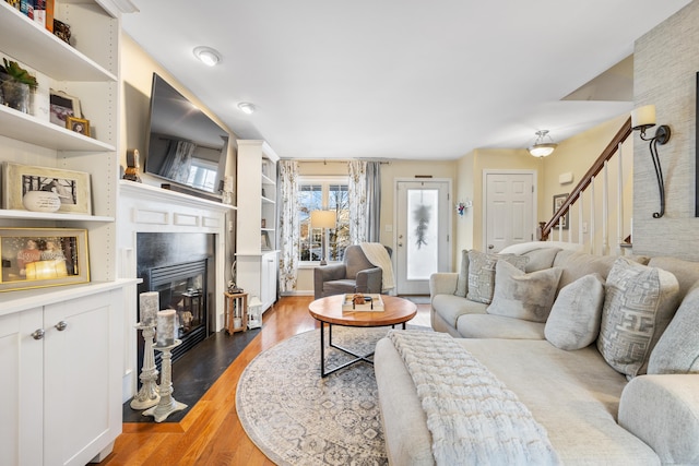 living room with dark hardwood / wood-style flooring