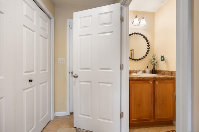 bathroom featuring tile patterned floors and vanity