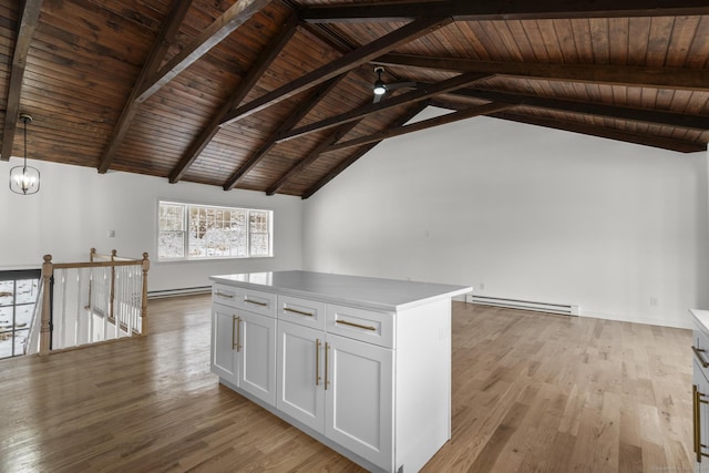 additional living space featuring a baseboard radiator, wooden ceiling, and light hardwood / wood-style floors