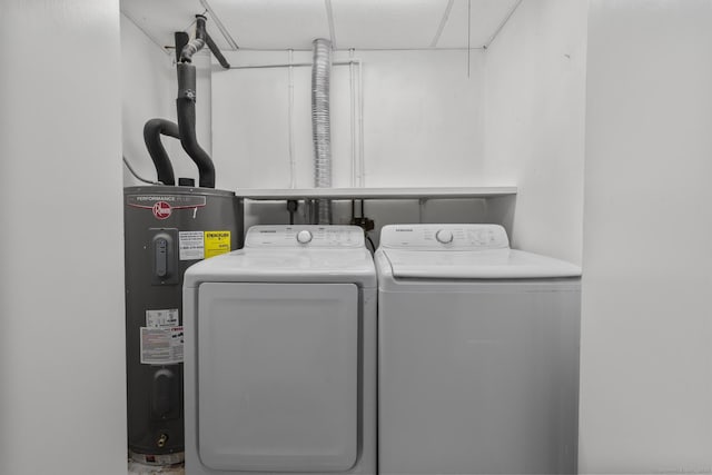 laundry area featuring washer and clothes dryer and water heater