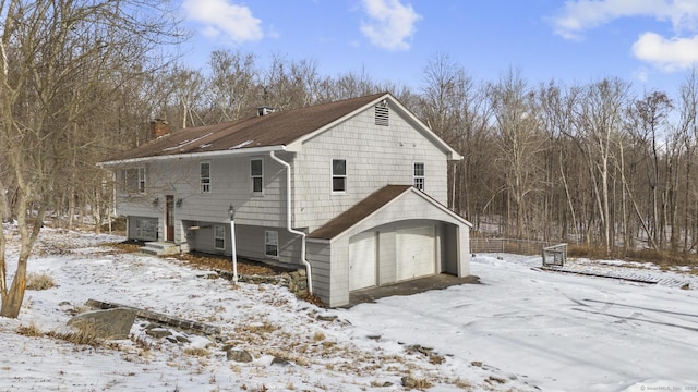 exterior space with a garage