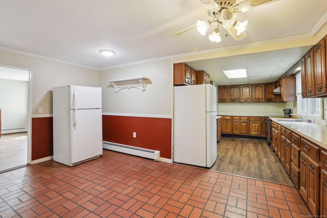 15 Seeley St, Danbury, CT 06810 - kitchen featuring freestanding refrigerator, a baseboard heating unit, range with electric stovetop, and crown molding