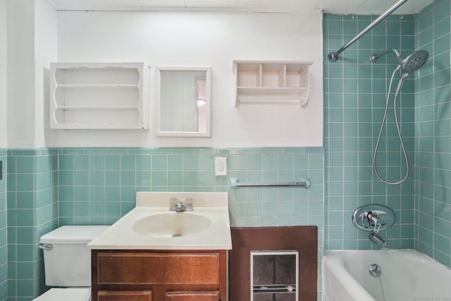 15 Seeley St, Danbury, CT 06810 - bathroom featuring vanity, toilet, shower / bath combination, tile walls, and heating unit