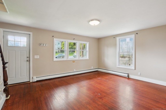 15 Seeley St, Danbury, CT 06810 - entryway with wood finished floors, plenty of natural light, a baseboard heating unit, and baseboards