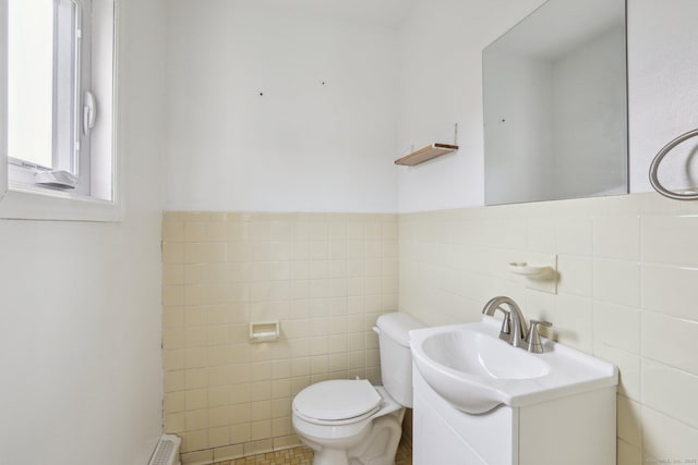 15 Seeley St, Danbury, CT 06810 - bathroom featuring tile walls, toilet, vanity, and a wainscoted wall