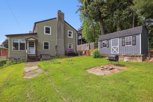 15 Seeley St, Danbury, CT 06810 - back of house featuring a chimney and entry steps