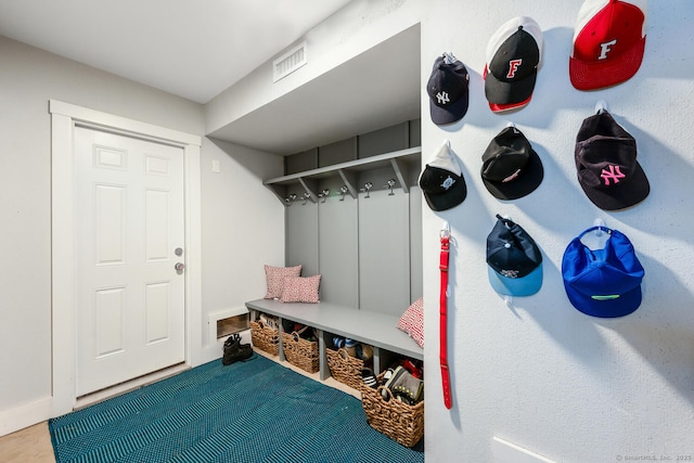 mudroom with carpet