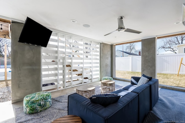 interior space featuring ceiling fan