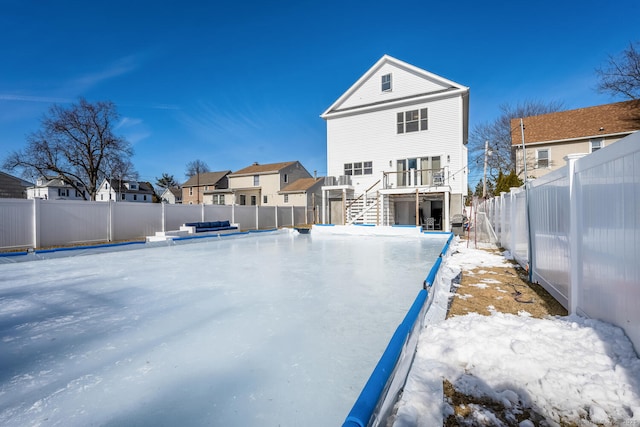 view of snow covered house