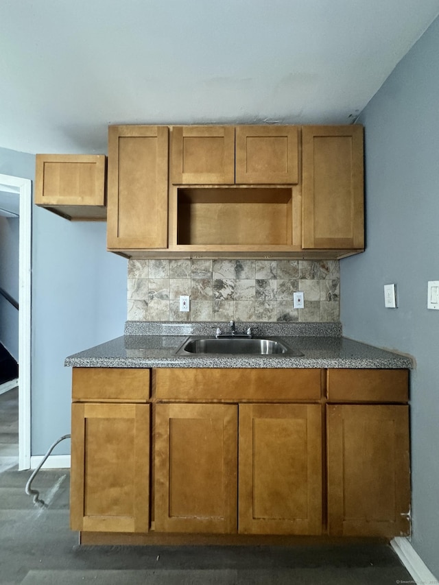 kitchen with sink and backsplash