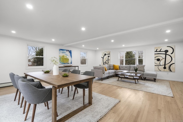 dining space featuring light wood-type flooring