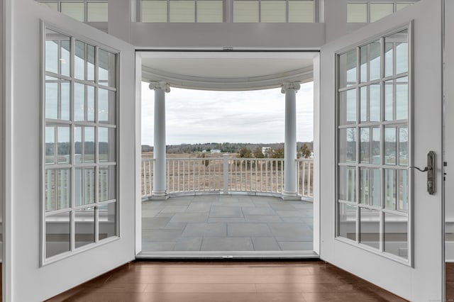 entryway with dark wood-type flooring