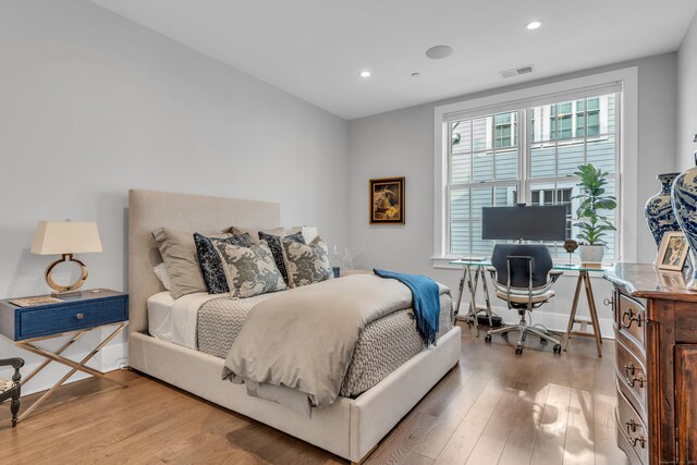 bedroom featuring light hardwood / wood-style flooring