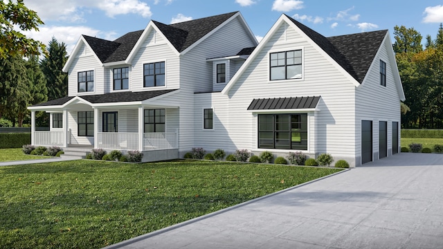 view of front of property with a porch, a garage, and a front yard