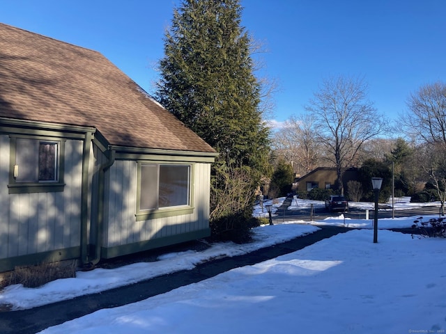 view of snow covered property