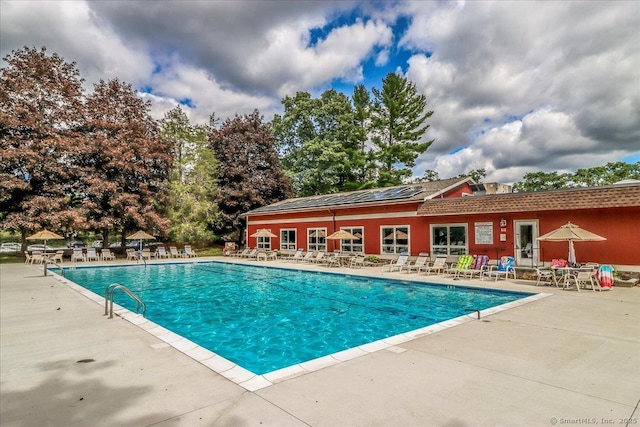 view of pool featuring a patio area