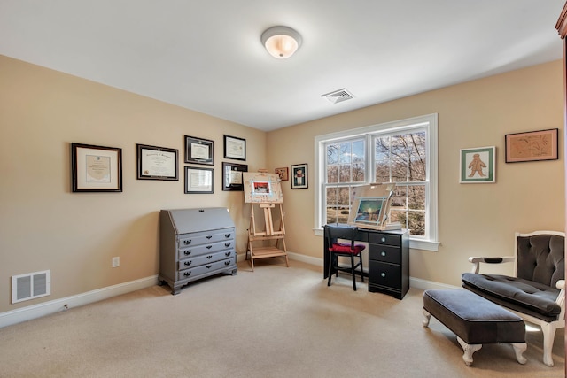 sitting room with carpet, visible vents, and baseboards