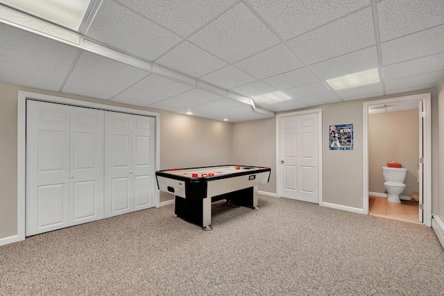 recreation room featuring carpet and baseboards