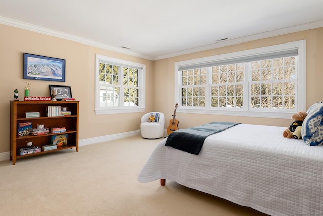 bedroom with baseboards, ornamental molding, and carpet flooring