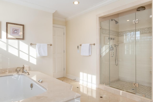 full bath with tile patterned floors, a garden tub, crown molding, a shower stall, and a sink