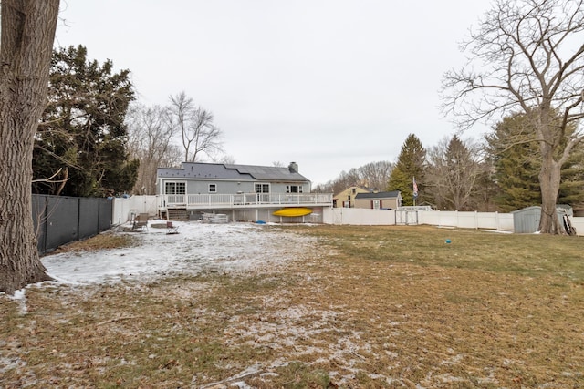 view of yard featuring a swimming pool side deck