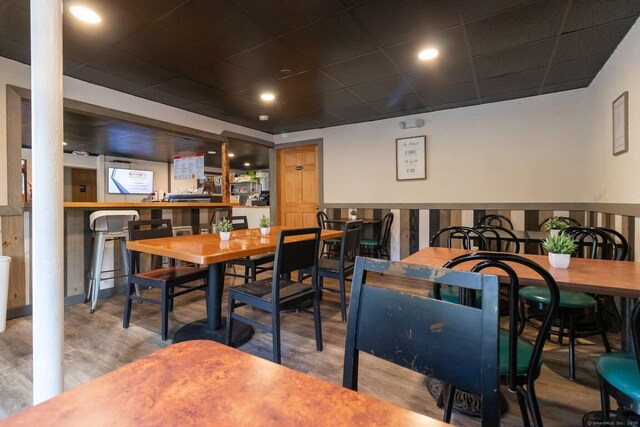 175 Main St, Winchester, CT 06098 - dining space featuring a drop ceiling and hardwood / wood-style floors
