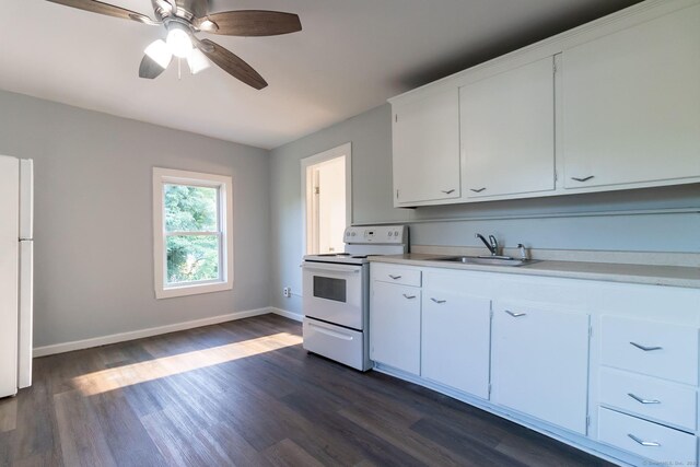 175 Main St, Winchester, CT 06098 - kitchen featuring white cabinetry, sink, dark hardwood / wood-style flooring, ceiling fan, and white appliances