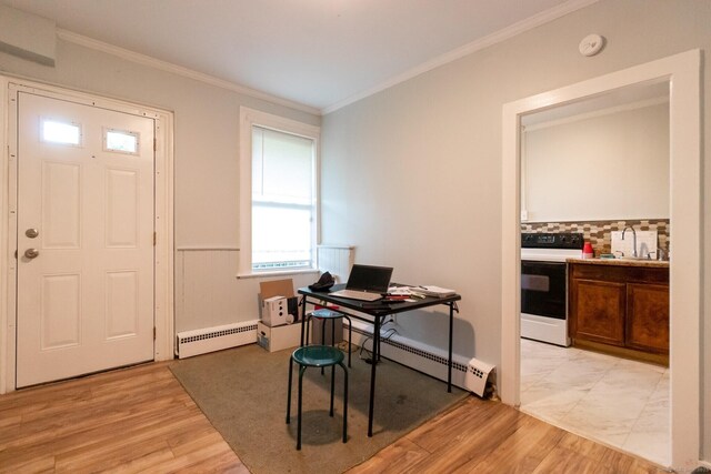 175 Main St, Winchester, CT 06098 - office space featuring a baseboard heating unit, ornamental molding, light hardwood / wood-style floors, and sink