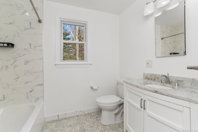 bathroom with baseboards, shower / tub combination, vanity, and toilet