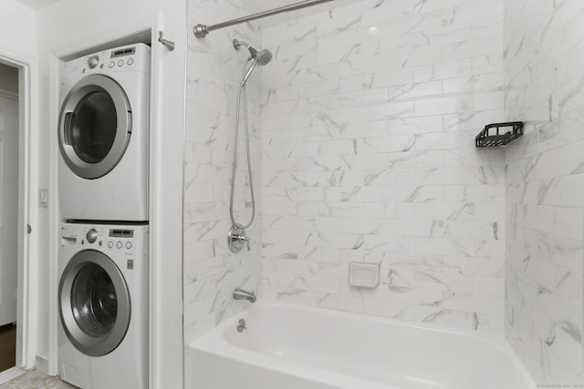 laundry area with laundry area and stacked washer and clothes dryer