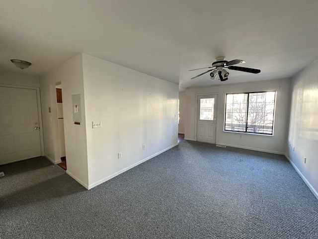 unfurnished room featuring carpet flooring and ceiling fan