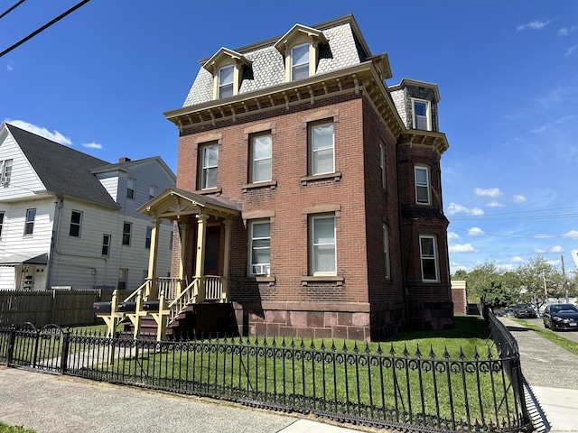 italianate home with a front yard