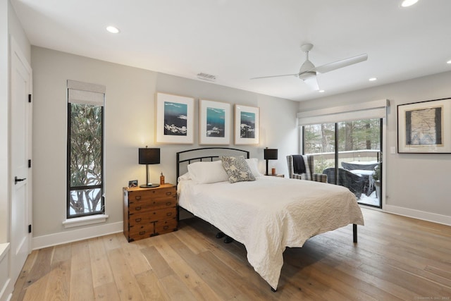 bedroom featuring ceiling fan, access to exterior, and light hardwood / wood-style flooring