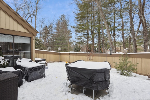 view of yard covered in snow