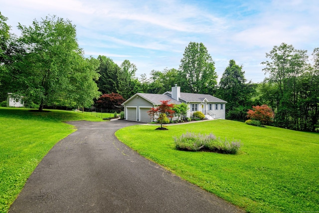 48 Bear Mountain Rd, Danbury, CT 06811 - ranch-style house with a chimney, asphalt driveway, a front lawn, and an attached garage