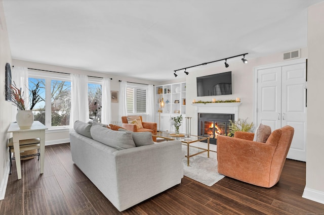 living room featuring dark hardwood / wood-style floors