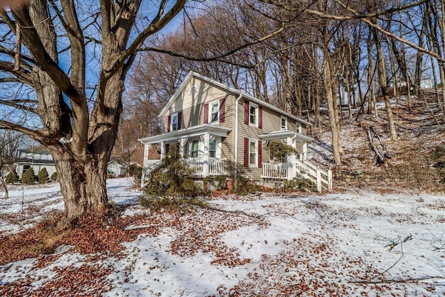 view of snow covered property