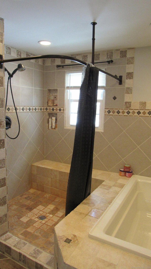 bathroom with sink and a shower with shower curtain