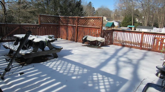 view of snow covered deck