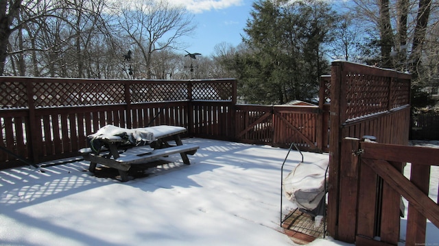 view of snow covered deck