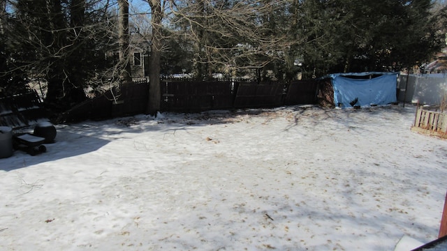 view of yard covered in snow