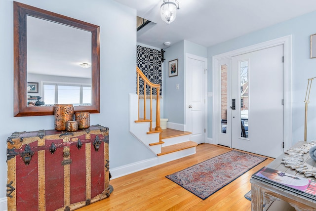 foyer entrance with wood-type flooring