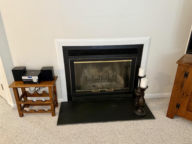 interior details featuring carpet flooring