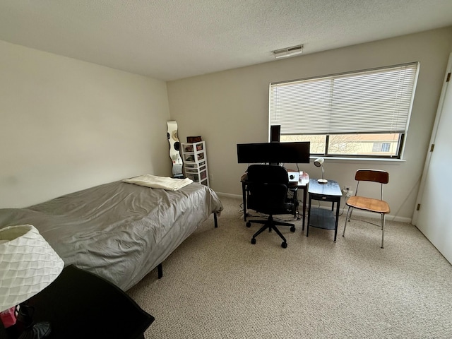 bedroom with a textured ceiling